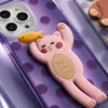Purple polka dot transparent phone case with pink cat stand and brown bear stand Application Scenario
